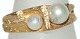 Gold ring with 
pearls, 14 
carat
Stamp: 585, 
Swedish Krone 
Q7
produced in 
1918
Size: 54, ...