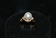 18 Carat Gold 
ring with Pearl 
and Diamonds 
Size: 52