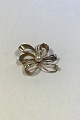 Hermann 
Siersbøl 14 K 
Gold Brooch  
with Diamonds 
Measures 2.8 cm 
x 3.5 cm(1 7/64 
in x 1 3/8 in) 
...