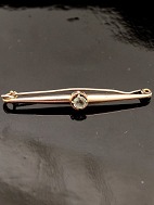 8 carat gold tie needle with blue stone