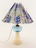Opaline oil lamp with light blue container changed to electricity. 