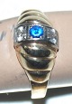 Gold ring with 
blue stone and 
zirconia, 14 
carat
Stamp: 585, 
SEJ
Goldsmith: 
1957-1973 ...