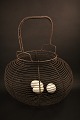 Large old 
French egg 
basket in fil 
de fer with a 
really fine 
patina.
H:40cm. 
Dia.:32cm.