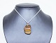 Brown and 
yellow stone in 
great 
condition. The 
chain can be 
purchased also.
3 x 2 cm.