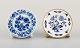To Meissen reklame tallerkenholdere i håndmalet porcelæn. Tidligt 1900-tallet.
