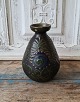 Kähler vase - 
kohorns 
decorated in 
blue, green and 
brown colors. 
The decoration 
looks like a 
...
