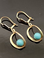14 carat gold earrings  with turquoise bal
