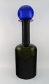 Holmegaard huge vase/bottle with lid in the shape of a ball, Otto Brauer. Dark 
blue and green art glass.
