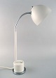 Asger Bay 
Christiansen. 
Adjustable 
table lamp. 
Model 'Table 
bully' of white 
lacquered 
metal, ...