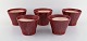 Five Bo Fajans 
Marianne flower 
pots in glazed 
ceramic. 
Beautiful red 
glaze and 
geometric ...