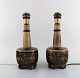 Nils Thorsson 
(1898-1975) for 
Royal 
Copenhagen. Two 
stoneware table 
lamps mounted 
on four feet 
...