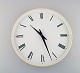 Henning Koppel 
for Georg 
Jensen. White 
plastic wall 
clock. Dial 
with Roman 
numerals. 
Clockwork ...