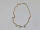 Necklace with five Daisies. Not silver.Hallmarked "DOUBLE".Length 38.0 cm.Perfect ...