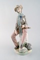 Lladro, Spain. 
Large porcelain 
figure. 
Troubadour. 
1980 / 90's.
Measures: 35 x 
15 cm.
In very ...