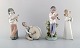 Lladro, Spain. 
Four porcelain 
figurines. 
Children with 
instruments. 
1980's.
Largest 
measures: ...