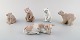 Lladro, Spanien. Fem porcelænsfigurer. Fire bjørne og en kalv. 1980/90