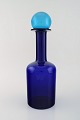 Otto Brauer for 
Holmegaard. 
Large vase / 
bottle in blue 
...