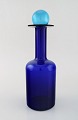 Otto Brauer for 
Holmegaard. 
Large vase / 
bottle in blue 
art glass with 
blue ball. ...