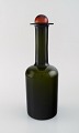 Otto Brauer for 
Holmegaard. 
Large vase / 
bottle in green 
...