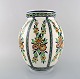 Charles Catteau (1880-1966) for Boch Freres Keramis, Belgium. Large art deco 
ceramic vase in cloisonné technique. Hand painted with flowers. 1920 / 30