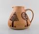 European studio 
ceramist. 
Unique jug in 
glazed ceramic. 
Dated 1947.
Measures: 22 x 
17 cm.
In ...