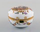 Antique Meissen lidded jar in hand-painted porcelain with romantic scene and 
gold decoration. 19th century.
