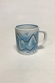 Royal 
Copenhagen 
Small Annual 
Mug 1989. 
Designed by 
Wilhelm 
Freddie. 
Measures 7.5 cm 
/ 2 61/64 in.