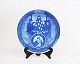 Anniversary 
plate with 
Maria and the 
baby, year 
1908-1983, by 
Royal 
Copenhagen.
24 cm.
