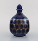 European studio 
ceramist. 
Unique carafe 
in glazed 
ceramics. 
1980's.
Measures: 18 x 
12 cm.
In ...