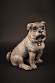 1800 Century 
painted 
terracotta 
figure of the 
dog with glass 
eyes and a fine 
patina. H:16cm. 
...