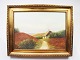 Oil painting in 
warm colors 
with motif of 
fields and 
thatched house 
with gilded 
frame.
64 x 81 cm.