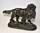 Bronze figure 
of hunting dog 
with bird, 19th 
century, 
France. On oval 
foot. Stamped. 
L: 18 cm. ...