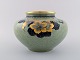 Royal Copenhagen vase in crackled porcelain with gold decoration and floral 
motifs. 1920