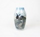 Smaller vase 
with motif of a 
mill, no.: 
546-5243, by 
Bing & 
Grøndahl.
26 x 11 cm.