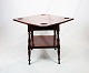 Antique game 
table of 
mahogany with 
extentions from 
around the year 
1880. The table 
is in great ...