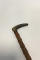 Antique Irish 
walking stick 
w. head of 
carved antlers 
horn and shaft 
of black thorn. 
Collar of ...