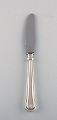 Cohr, Danish 
silversmith. 
Dinner knife in 
silver (830). 
Dated 1956.
In very good 
...