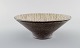 Mari Simmulson for Upsala-Ekeby. Bowl in modern stylish design. Glazed stoneware 
/ ceramics. Mid-20th century.
