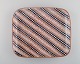 Anna-Lisa 
Thomson for 
Upsala-Ekeby. 
Large dish in 
glazed 
stoneware. 
Striped design. 
Mid-20th ...