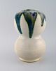 European studio 
ceramist. Large 
unique vase in 
glazed 
ceramics. 
Beautiful green 
blue glaze on a 
...