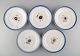 Five antique 
Royal 
Copenhagen 
plates in 
hand-painted 
porcelain with 
flowers and 
blue border 
with ...
