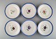 Six antique 
Royal 
Copenhagen 
plates in 
hand-painted 
porcelain with 
flowers and 
blue border 
with ...