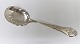 French Lily. 
Silver 
strawberry 
spoon. Length 
27 cm. Produced 
1924.