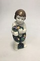 Aluminia by 
Rasmus Harboe. 
Angel with 
flowers around 
the waist. no. 
987/815. H: 27 
cm (10 5/8"). 
...