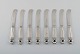 Eight Georg 
Jensen Acorn 
butter knives 
in all sterling 
silver.
Length: 15 cm.
In very good 
...