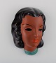 Goldscheider, 
Austria. Art 
deco female 
face in 
handpainted 
glazed 
ceramics. Dated 
...
