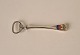 Patricia 
capsule opener 
in silver with 
Silkeborg's 
city coat of 
arms in enamel. 

Stamped the 
...