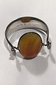 Georg Jensen 
Sterling Silver 
Torun Armring 
No 203 and 
Stone 203A 
Measures inside 
5.6 cm( 2 13/64 
...