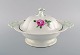 Large antique Meissen lidded tureen in hand-painted porcelain with pink roses. 
Early 20th century.
