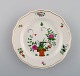Meissen plate in hand-painted porcelain with floral motifs. Early 20th century.
